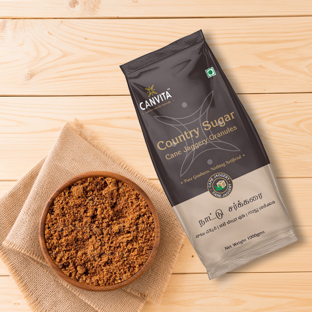 Close-up of Nattu Sakkarai jaggery granules – natural golden-brown colour, no preservatives or artificial additives
